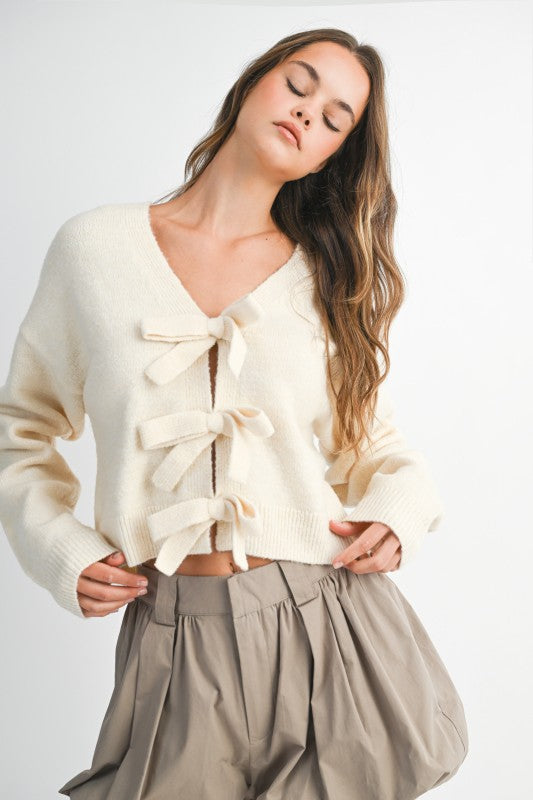 Bow & Tell Reversible Knit Sweater
