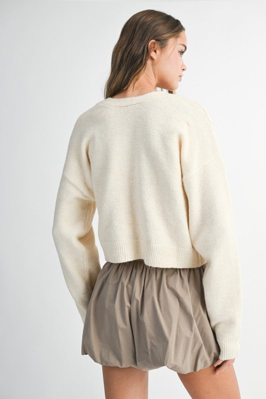 Bow & Tell Reversible Knit Sweater