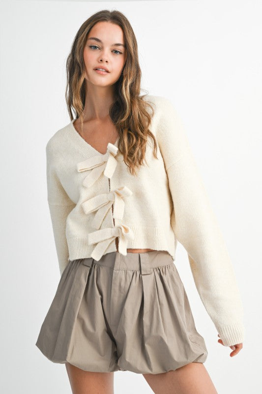 Bow & Tell Reversible Knit Sweater