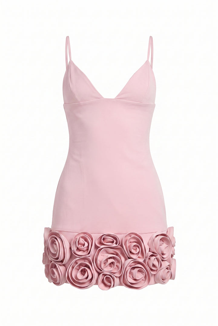 Front product view of the pink Sculpted in Roses mini dress with a dimensional rose hem.